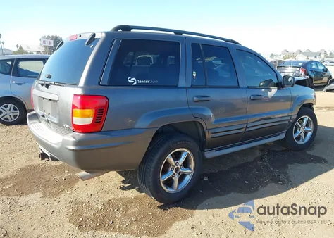 2002 Jeep Grand Cherokee Overland from USA, damaged, VIN 1J8GW68J52C104071
